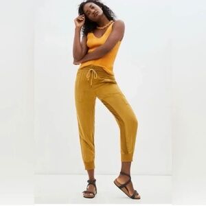 By Anthropologie The Nomad Gold Joggers Pants size Medium